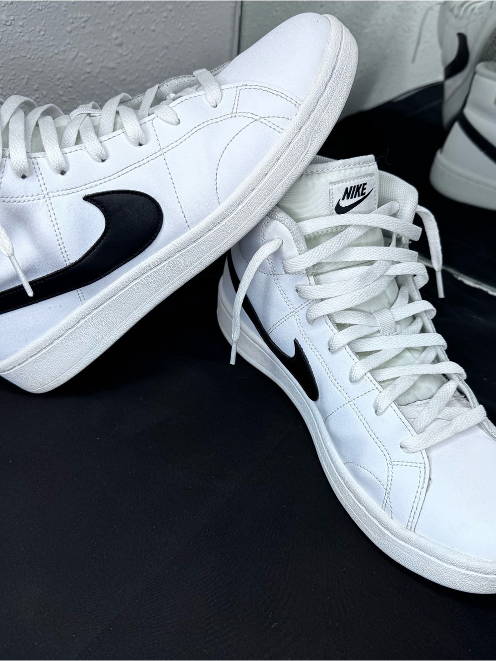 Nike White High-Top Sneakers with Black Swoosh Accent - Picture 1 of 10